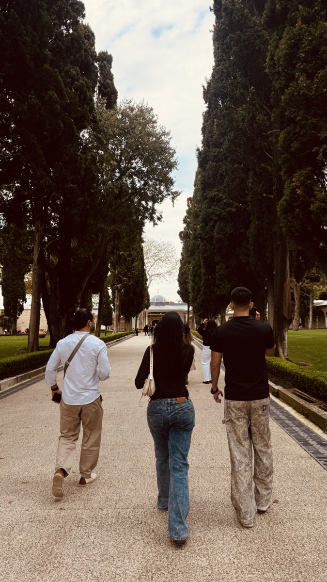 Walking with friends through the palace gardens in Istanbul